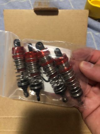 Amortiguadores Wltoys 144010 (4 uds) 1 mes de uso