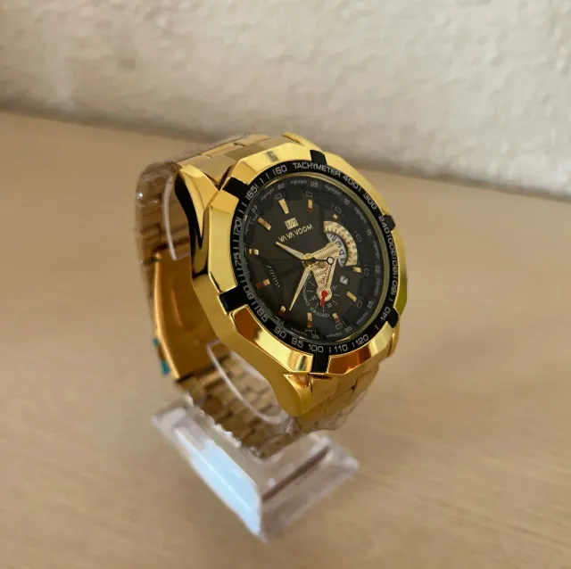 Reloj Dorado y Negro 