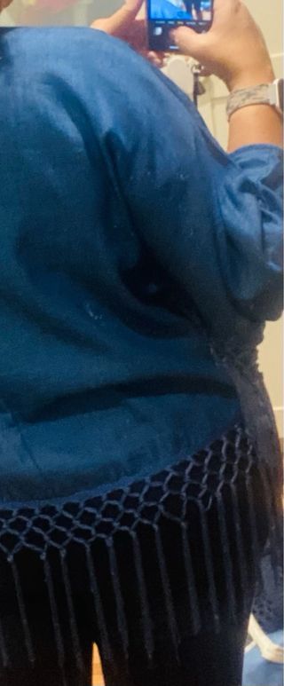 Chaqueta azul con flecos