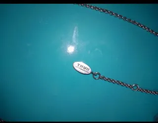 Collana con ciondolo a forma di fiore