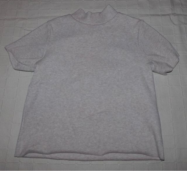 Jersey beige cuello alto