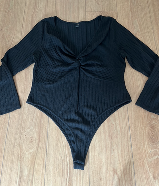 body negro de manga larga de canale escote cruzado