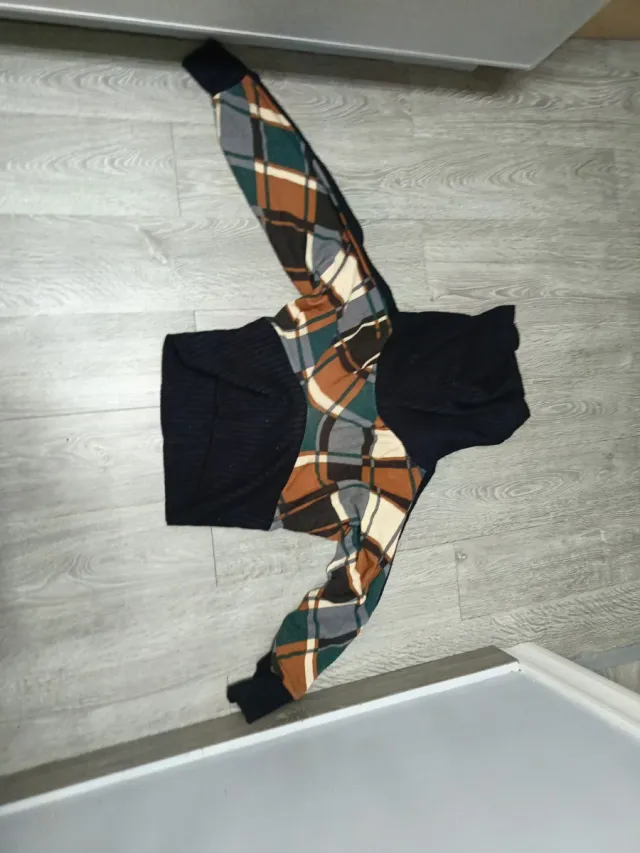 Jersey cuello alto estampado rombos