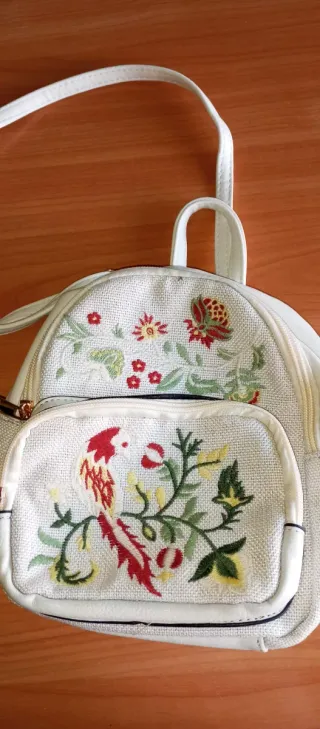 Mochila pequeña bordada pájaro