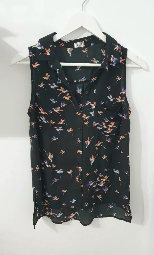 Blusa sin mangas con estampado de pájaros