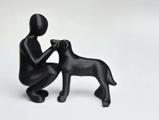 Statua uomo e cane decorazione casa