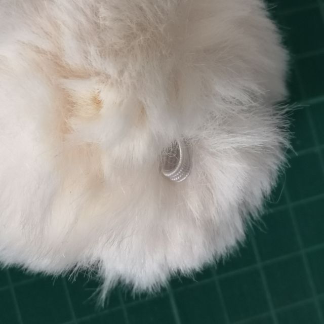 Pompon bianchi con coulisse