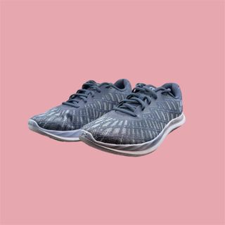 Zapatillas Under Armour grises y blancas