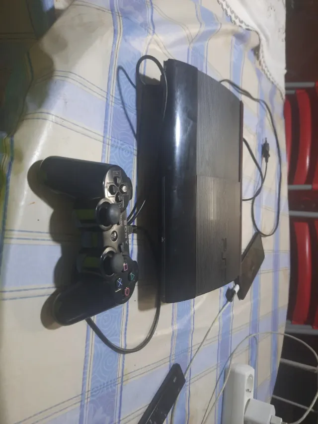 Consola PlayStation 3 Negra y 5 juegos