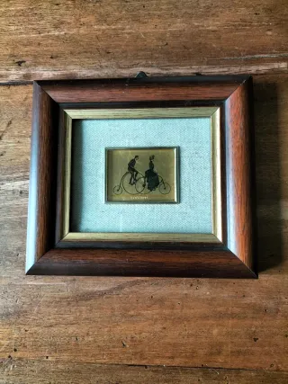 Quadretto foglia d'oro coppia in bici