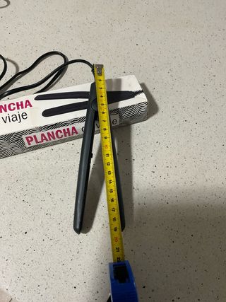 Plancha de pelo de viaje negra