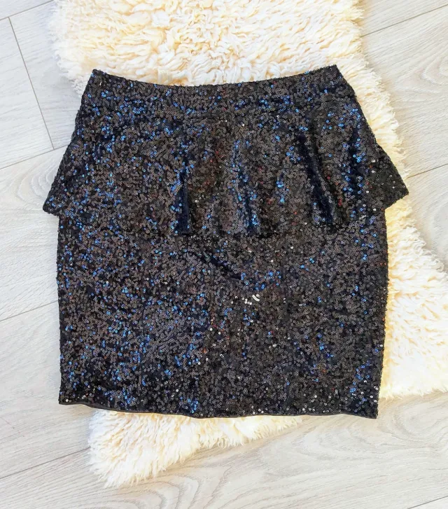 Talla S - Minifalda negra péplum y lentejuelas