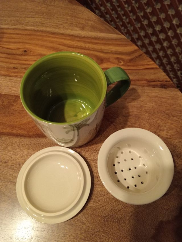 Taza cerámica palmeras y té. No sé hacen envíos.