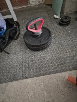 Banco de pesas y polea
