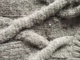 Maglione grigio trecce donna