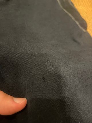 Pantaloni Nike Tech neri e grigi