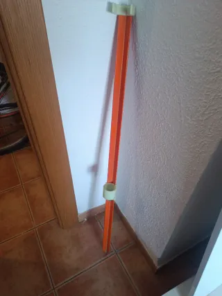 Palo de pesca naranja