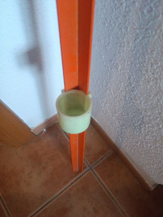 Palo de pesca naranja