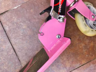 Patinete infantil plegable rosa con luz