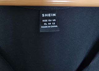 Vestido negro manga calada