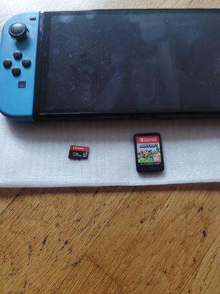 Nintendo Switch OLED blu/rosso