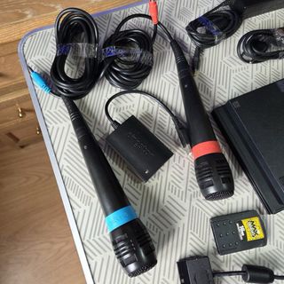 Consola PS2 Slim + 4 Juegos Singstar funcionando