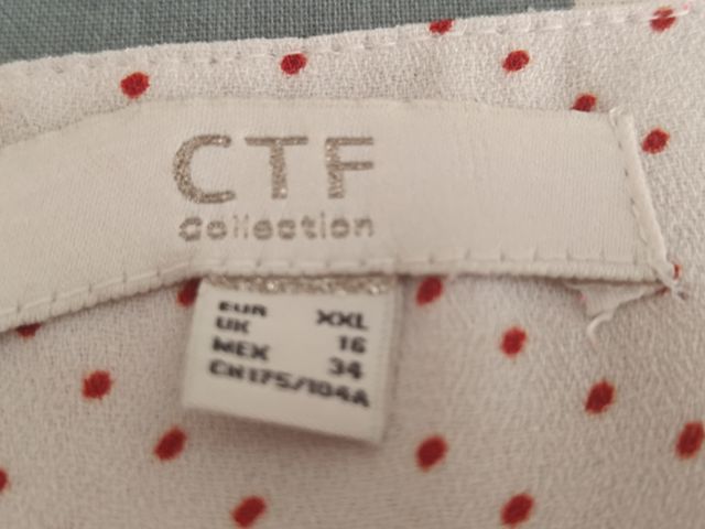 Camisa de lunares sin botones con mangas 3/4