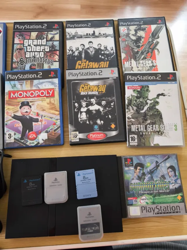 Ps2 Slim + 12 Juegos+2 mandos+4 memory card