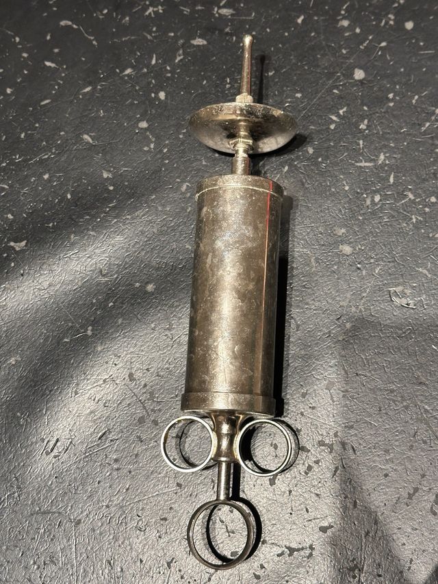 Jeringa antigua instrumental médico