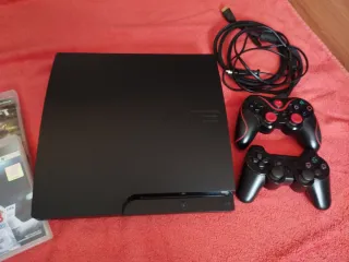 PS3 Negra + 2 Mandos + 2 Juegos