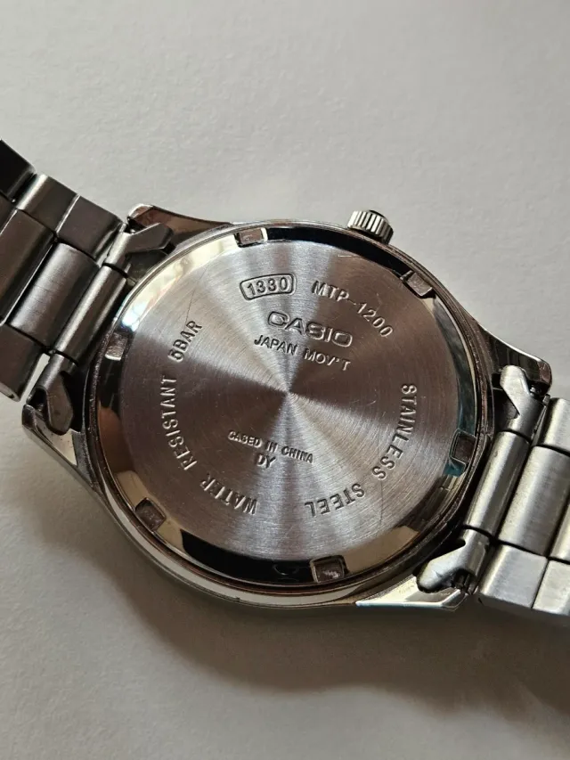 Reloj Casio analógico y correas