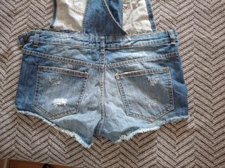 Peto corto vaquero desgastado