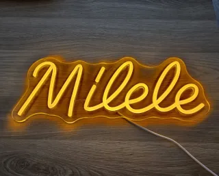 Letrero Neón amarillo Milele (Para siempre)