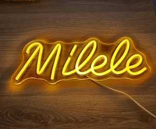 Letrero Neón amarillo Milele (Para siempre)