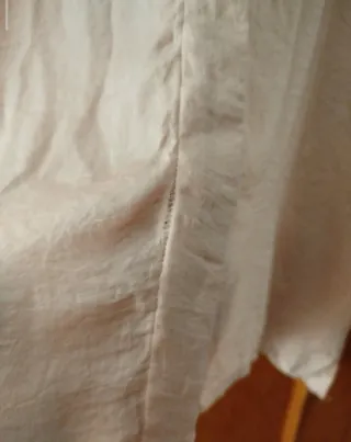 Blusa rosa manga larga.