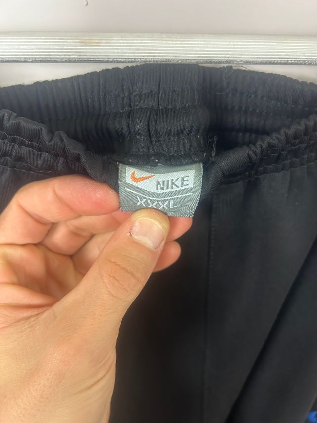 Pantaloni sportivi Nike Solo Swoosh blu ricamati retrò