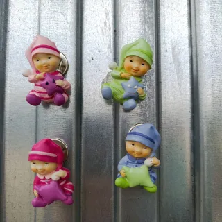 Imanes de bebé con estrellas y almohadas