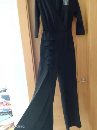 Mono negro elegante sin estrenar
