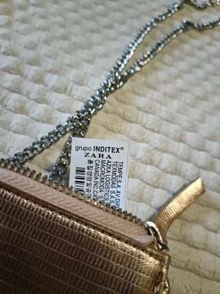 Bolso fiesta Zara dorado nuevo.