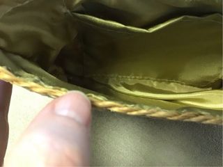 clutchBolso de mano de fibras naturales con concha