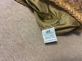 clutchBolso de mano de fibras naturales con concha