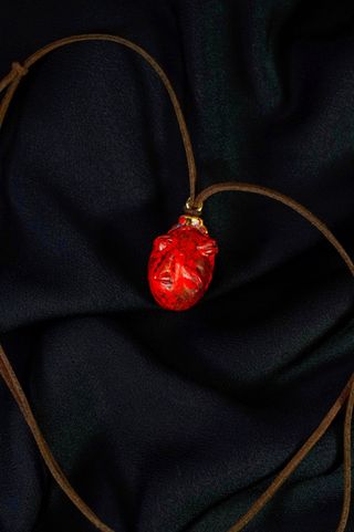 Berserk Decayed Sleeping Behelit Collana Pendente