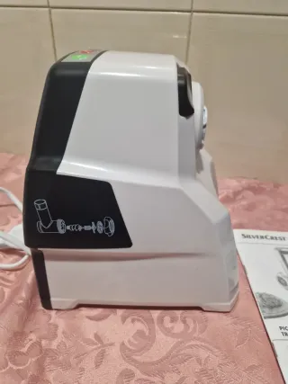 Tritacarne SilverCrest con accessori