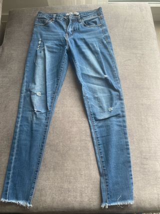 Pantalón vaquero mujer desgastado