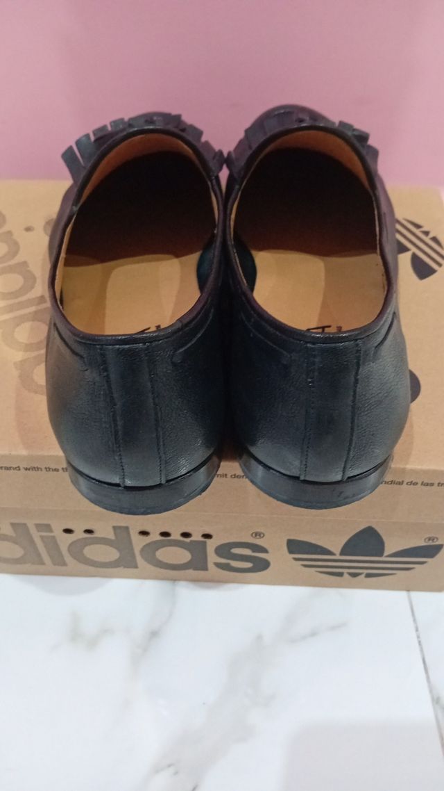 Scarpe uomo nere con nappine