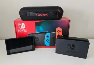 Consola Switch con caja y maletín como nuevos LEER