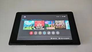 Consola Switch con caja y maletín como nuevos LEER