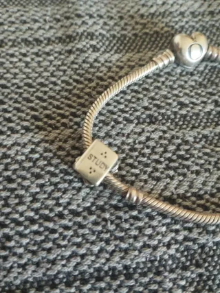 Pulsera Pandora Corazón con tres charms