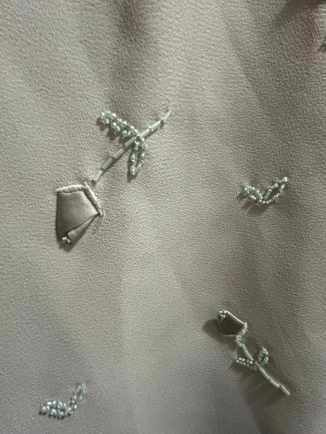 Abito verde con giacca e ricamo