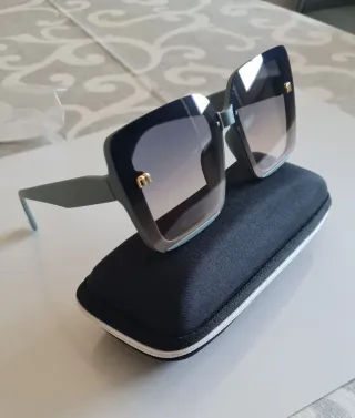 Occhiali da donna Miu Miu